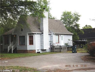Exterior Front - Corner Lot.  Paved driveway can b
