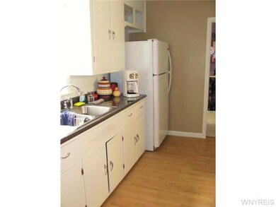 Kitchen. Kitchen in lower unit with laminate floor