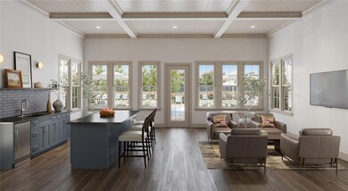 Kitchen with a kitchen bar, coffered ceiling, a ki