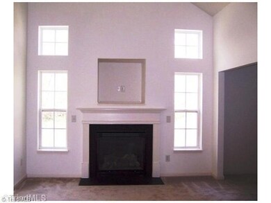 Living Room. Large, vaulted ceiling living room has a gas log fireplace.