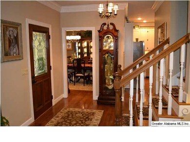 You enter the home through a custom solid wood doo