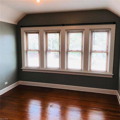 Larege bank of windows in bedroom