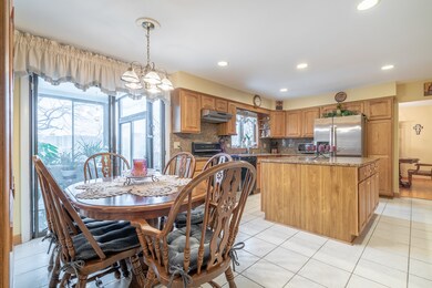 Great eat in kitchen overlooking yard and fireplac
