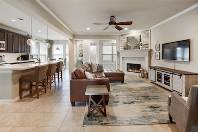 Towards the back of the home is the open concept kitchen and living room area. Isn't this lovely!