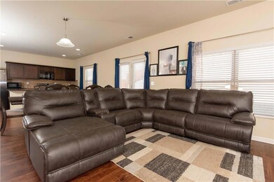 Living room featuring recessed lighting, visible v