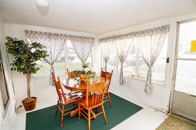 Front enclosed porch.