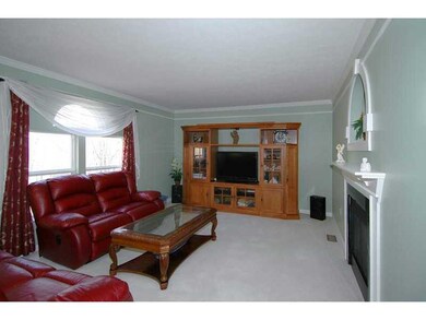 Family Room. A recessed display niche rests above 