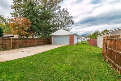 2 car Attached Garage and great yard!