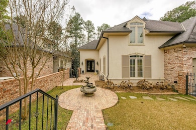 Back of house with a shingled roof, fence, a lawn,