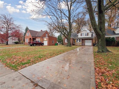 View of driveway and garage