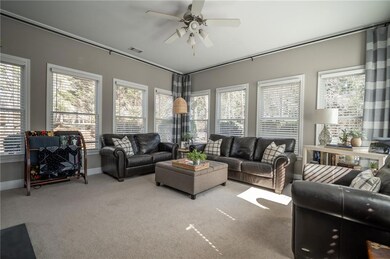 Living room featuring a wealth of natural light, v