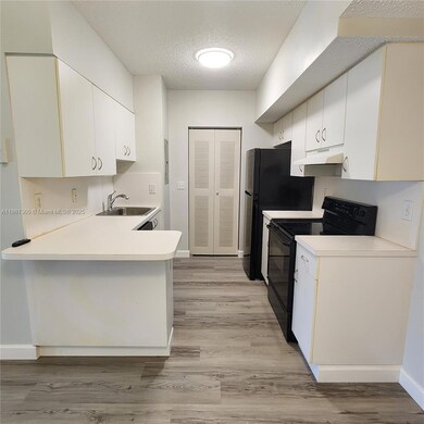 3251 Sabal Palm Manor unit 208, Hollywood, FL 33024 - photo 4