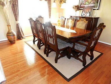 Dining Room. Formal dining room with hardwood floo