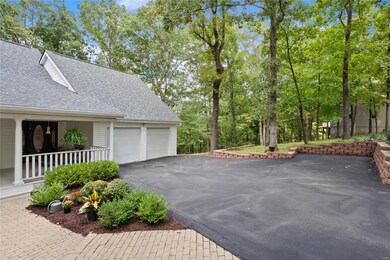 The driveway has a large turnaround for ease of ac