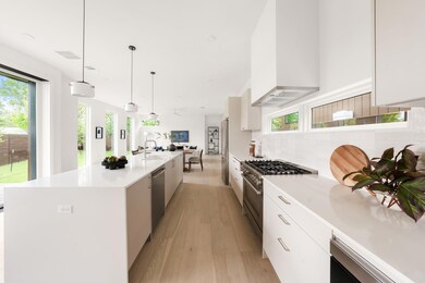 Kitchen with premium appliances, light wood-style