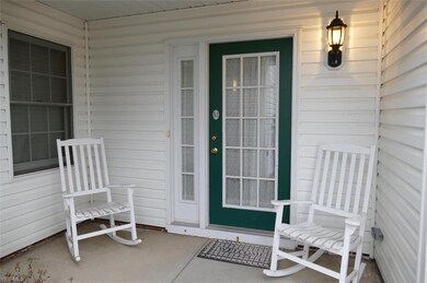 Super cute front porch ready for you to decorate.