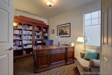 Private office/den w/french doors.