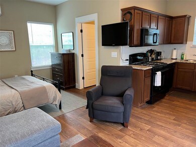 Bedroom featuring light wood-type flooring and a 