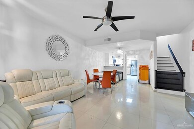 Tiled living room with ceiling fan