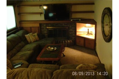 Den/Family/Great Room. Nice book shelves and wood 