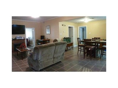 Living Room. living room opens into den, breakfast