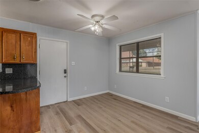 Unfurnished dining area featuring light hardwood /