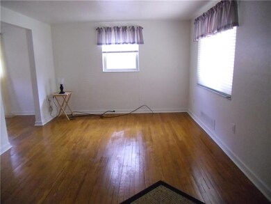 Living room with beautiful hardwood floors.