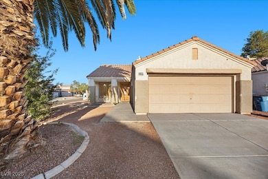 Mediterranean / spanish-style house featuring a ti