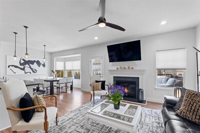 Inviting floorplan for all ages - note gas firepla