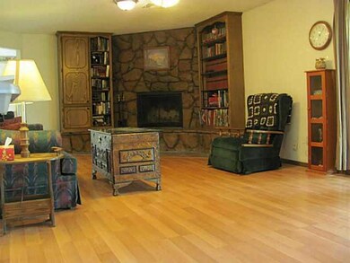 Exterior Front. Living room with gorgeous fireplac