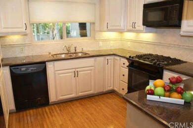 French Country Kitchen with granite counters and a