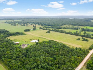 40 Acres, 1/2 wooded lends to lots of wildlife. Ho