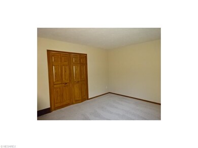 Bedroom 1 with new carpeting and freshly painted w
