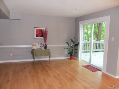 Open concept living across back of home. Opens to