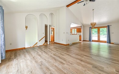 Open Concept Living / Dining Area with Knee Wall a