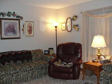 Living Room Living room has brand new carpeting  -