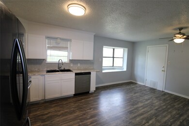 Doorway leads to the Garage