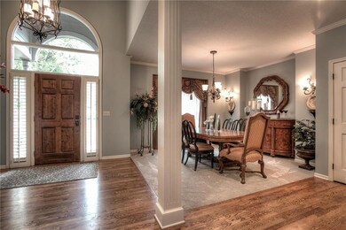 Warm and inviting entry with wood floors