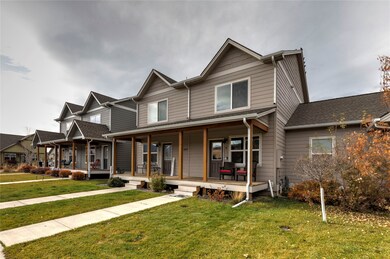 View of front of property with a front lawn and a porch