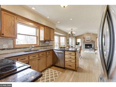kitchen is beauitfully updated with granite counte