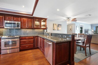 kitchen area and breakfast bar facing li