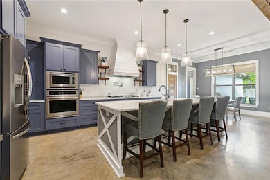 The chef's kitchen is an entertainer's dream! Cust