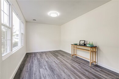 Spare room with dark hardwood floors