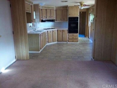 VIEW FROM LIVING ROOM TO KITCHEN