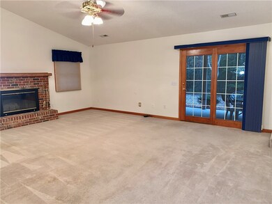 Family room with glass doors that lead to the cove