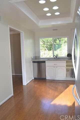 The kitchen has recessed lighting and connect dire