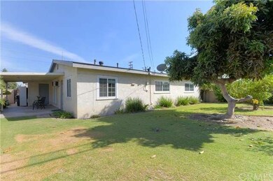 More room to roam back here with fruit trees including this PRODUCTIVE Avocado tree! Guacamole for everyone! Plenty of room on both side yards with that nice patio area just perfect for a summer BBQ.