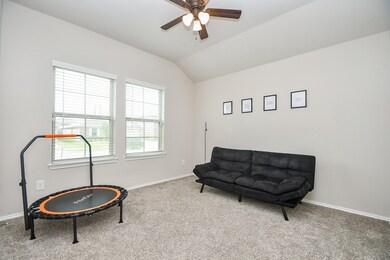 This spacious front room, just off the main entry,