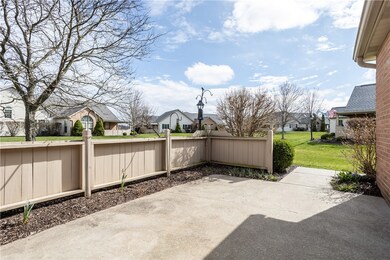 Private patio overlooking greenspace.