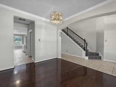 This is a spacious interior with a mix of tile and